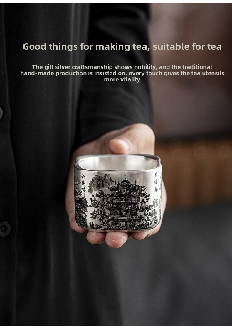 Master-crafted silver-plated Yueyang Tower Gongfu tea set (swing-handle pot and four cups)—premium home use and gift-ready.