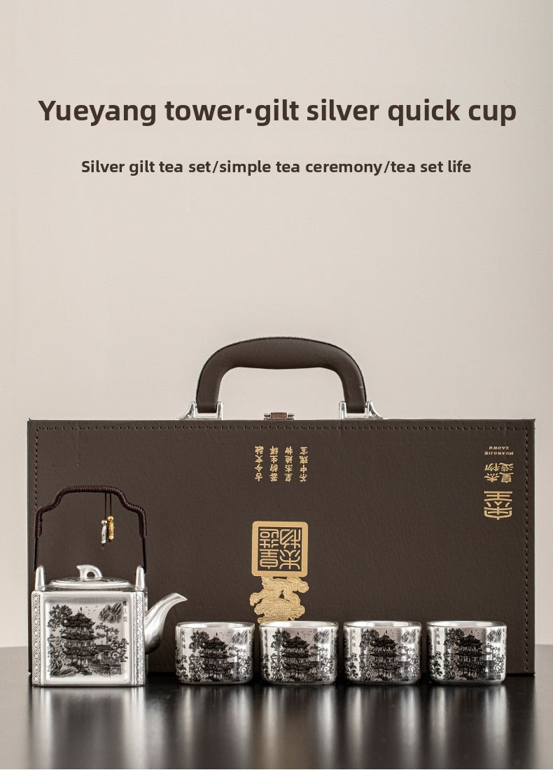 Master-crafted silver-plated Yueyang Tower Gongfu tea set (swing-handle pot and four cups)—premium home use and gift-ready.
