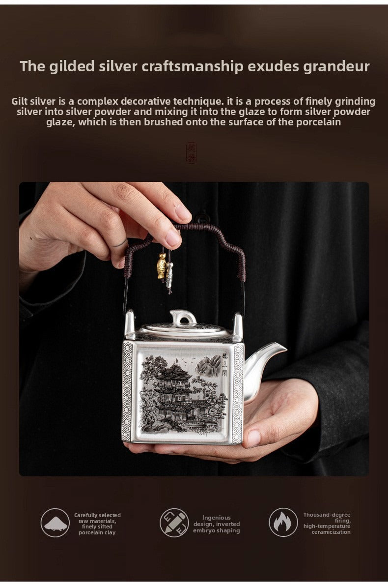 Master-crafted silver-plated Yueyang Tower Gongfu tea set (swing-handle pot and four cups)—premium home use and gift-ready.